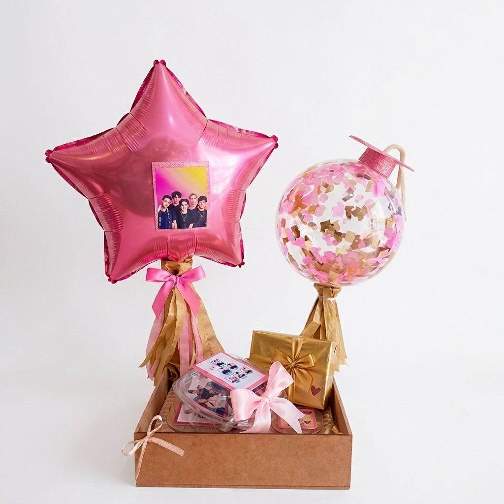 Base con foto personalizada, globo de estrella y pequeños regalos.